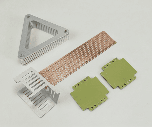 Precision laser cutting in action showing sparks and metal fabrication