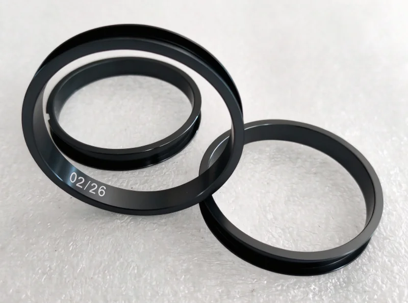 6061-T6 Aluminum Ring: Grey Anodized with an Ra 0.4 Internal Groove